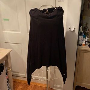 Long black shirt. Longer on the sides. New.